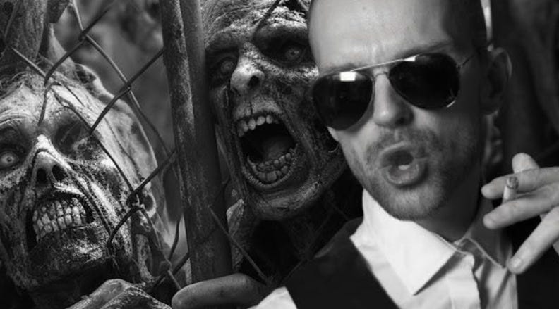 A black and white split-screen image showing a vampire-like woman holding a heart on a fork next to a man in sunglasses standing before aggressive, decaying zombies.
