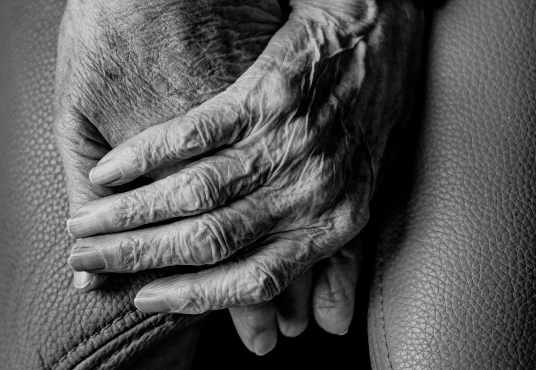 grayscale photography of human hands grayscale photography of human hands