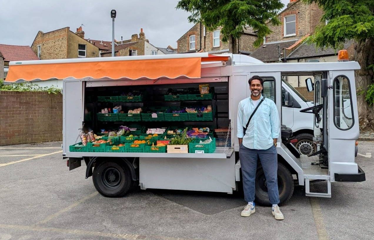 May be an image of 1 person, van and text