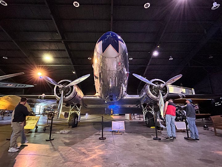 displays, exhibits, signs, planes