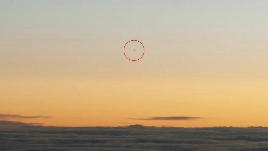 News article: "MYSTERY MACHINES – I am a Boeing 747 pilot – I’ve seen UFOs defying all known tech & I captured a cigar-shaped object on camera"