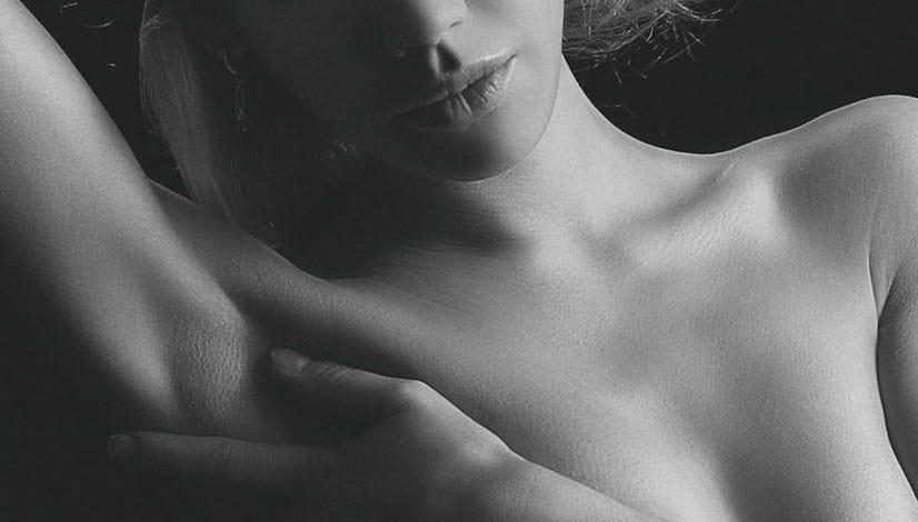 topless woman with long hair