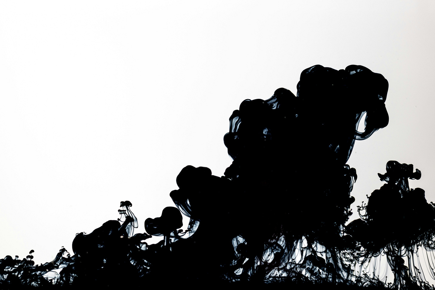 blank-ink-dissolving-in-clear-water