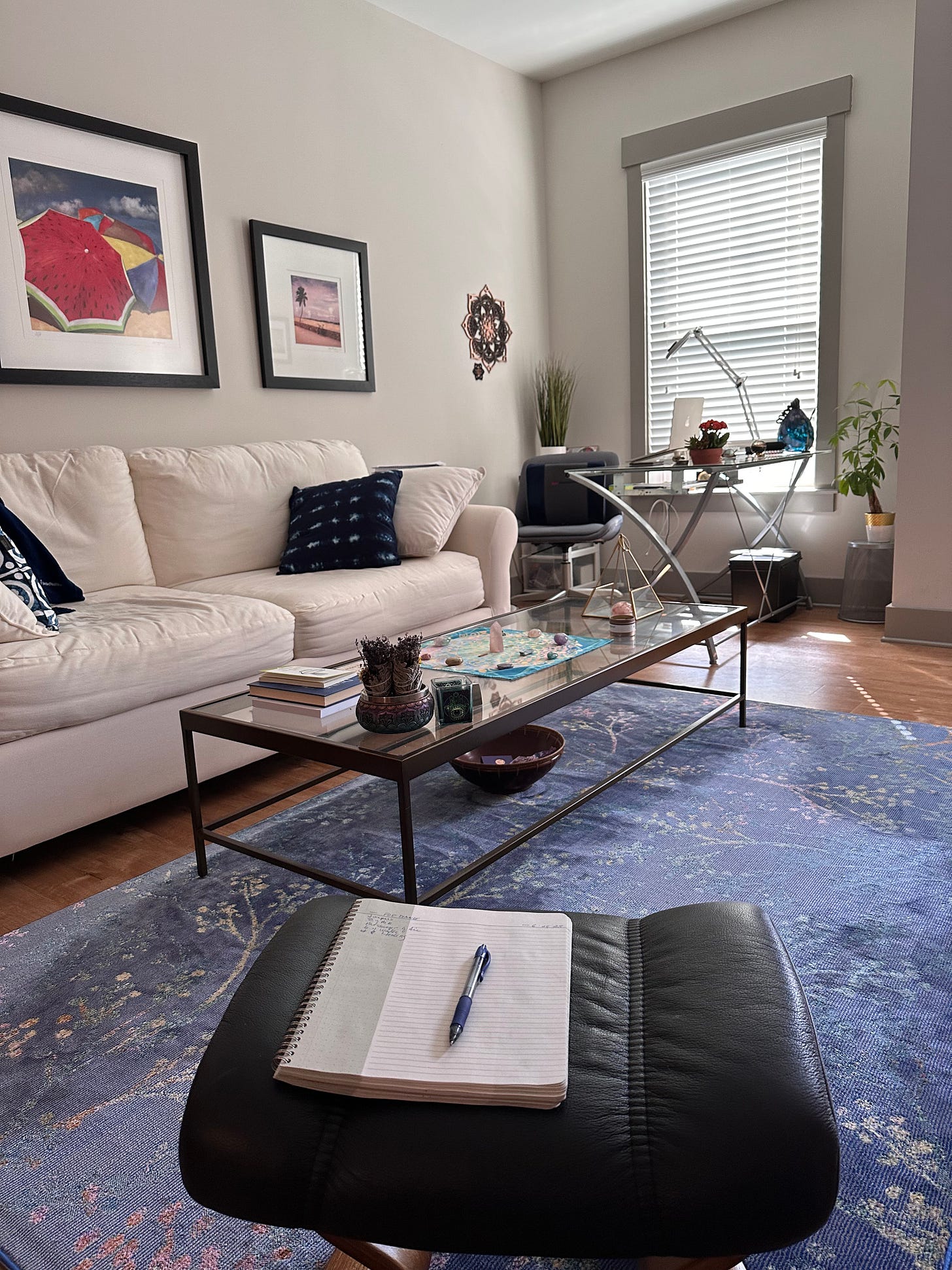 Bright Living room with couch, desk, coffee table, sunny window Bright Living room with couch, desk, coffee table, sunny window