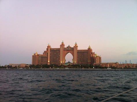 Dubai beach, resort, and twisted skyscraper building
