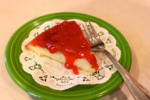 Cherry Pie Cake served with cherry sauce