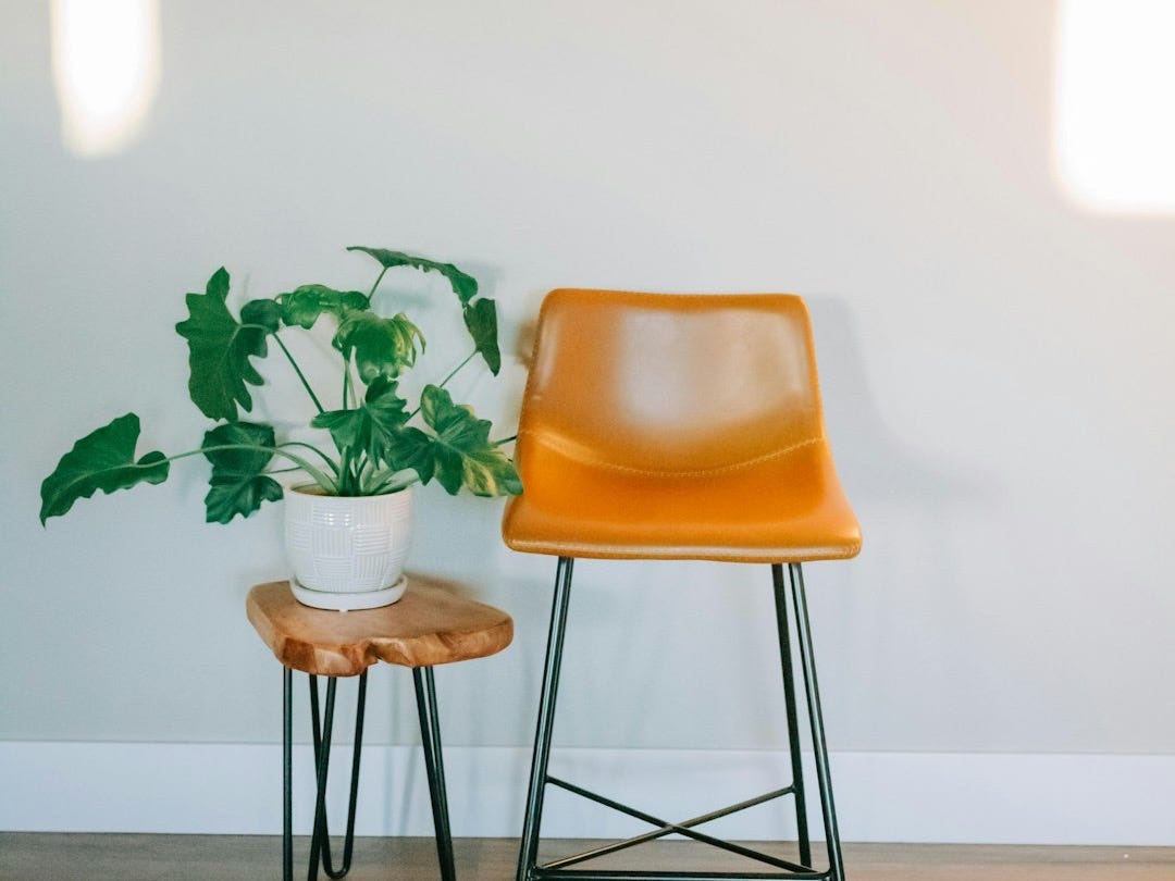 a chair and a table in a room