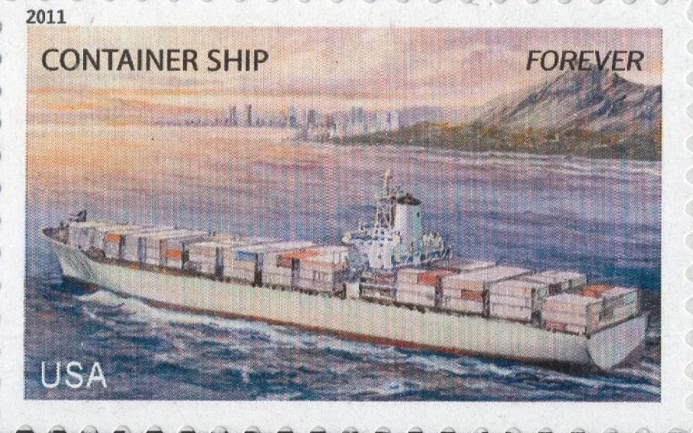 A postage stamp with a ship on the water

Description automatically generated