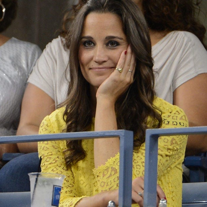 Pippa wearing a gold signet ring Pippa wearing a gold signet ring