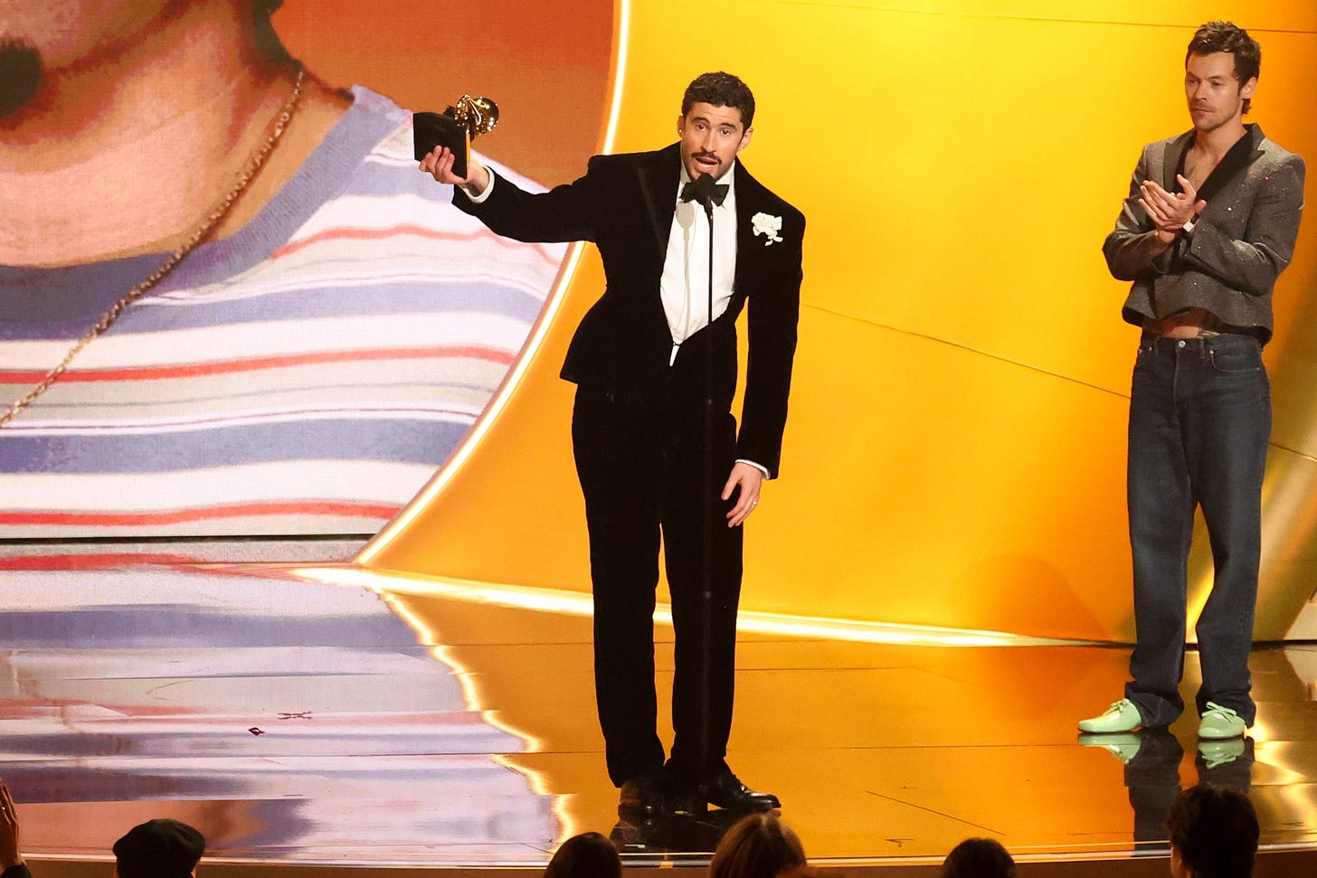 Image may contain Bad Bunny Clothing Formal Wear Suit Tuxedo Photography Adult Person and Performer