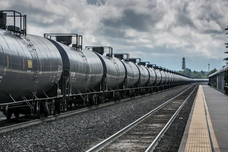 Above, a representational image of a train in Western Montana. A train operated by an unspecified company derailed nears Quinns, Montana, on Sunday morning.