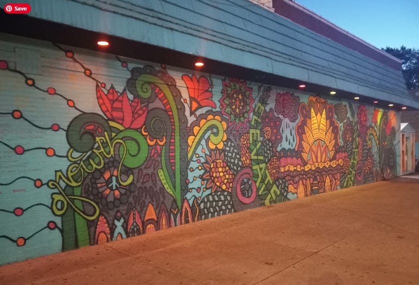 Honeybear Cafe artwork and fridge on side of building