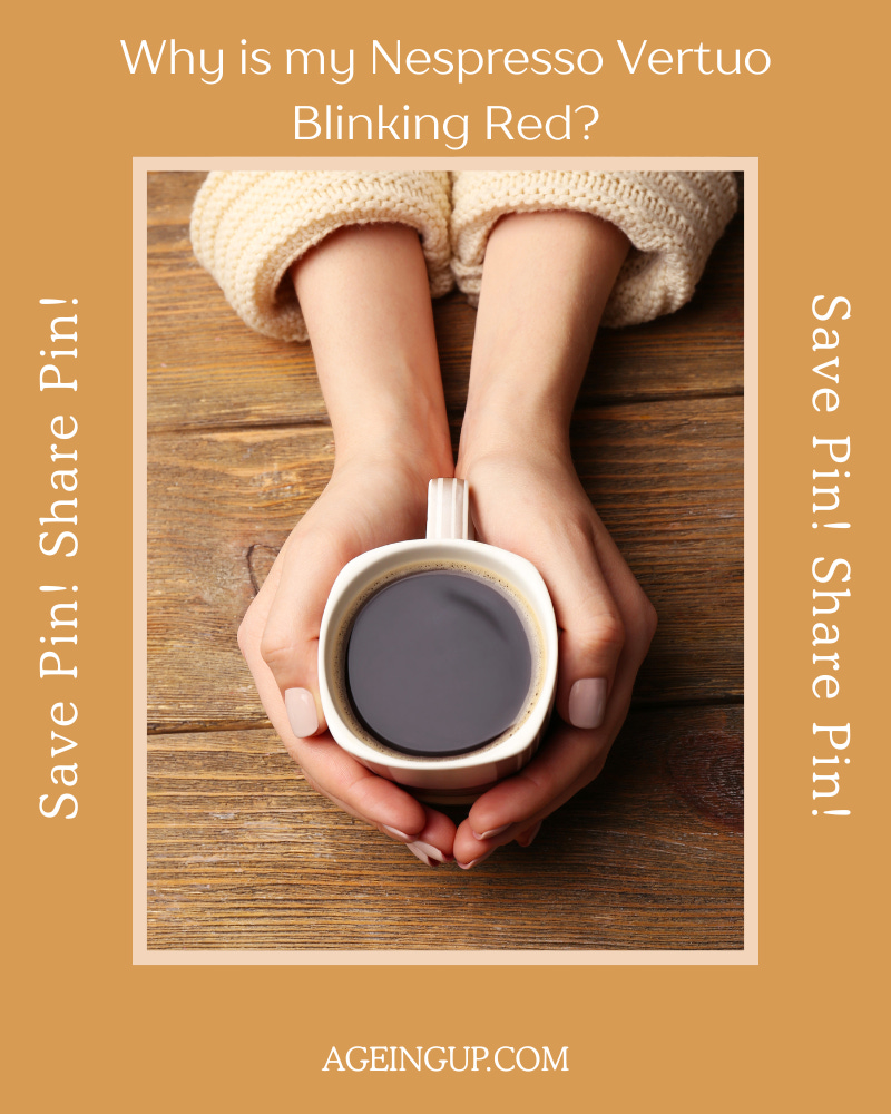 hands cupping a cup of black coffee after answering the question why is my nespresso blinking red