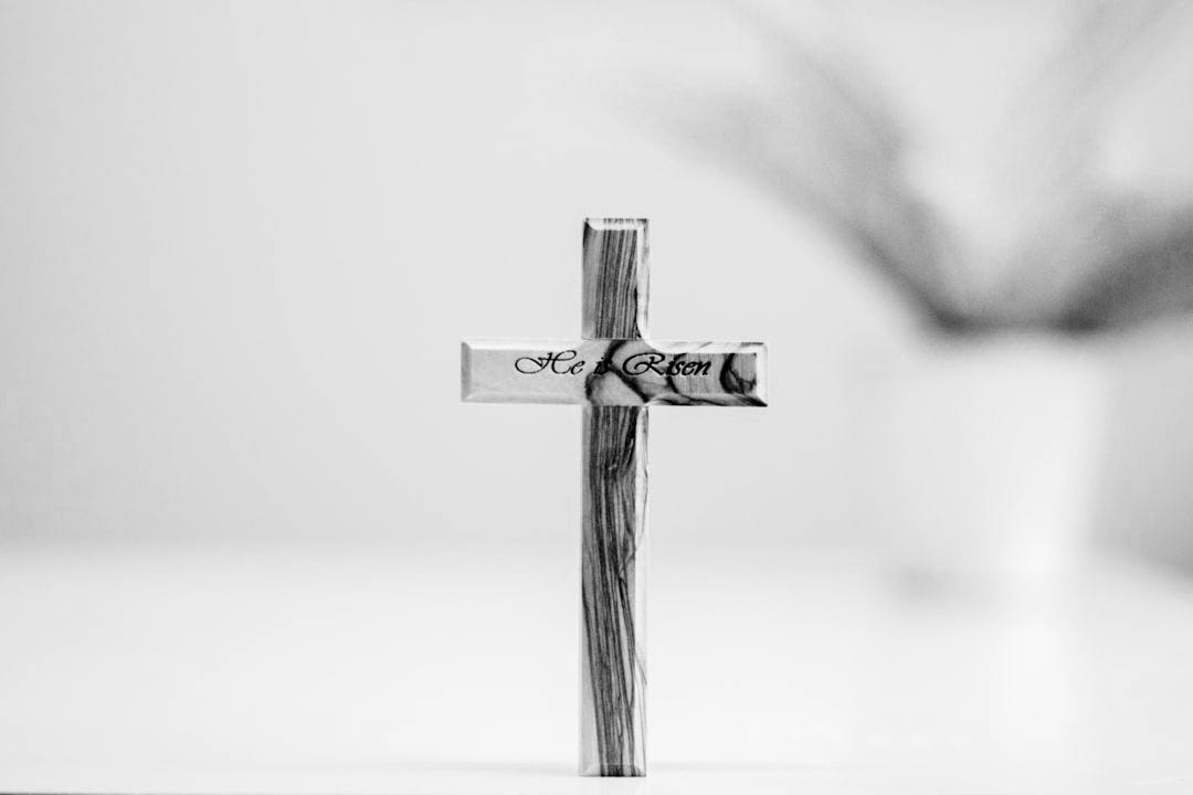 brown wooden cross with green leaves brown wooden cross with green leaves