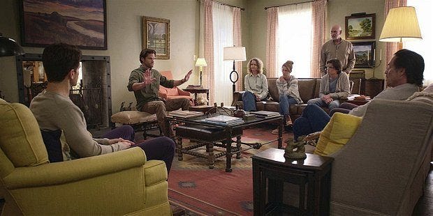 Walker family sitting down having family meeting. Walker family sitting down having family meeting.