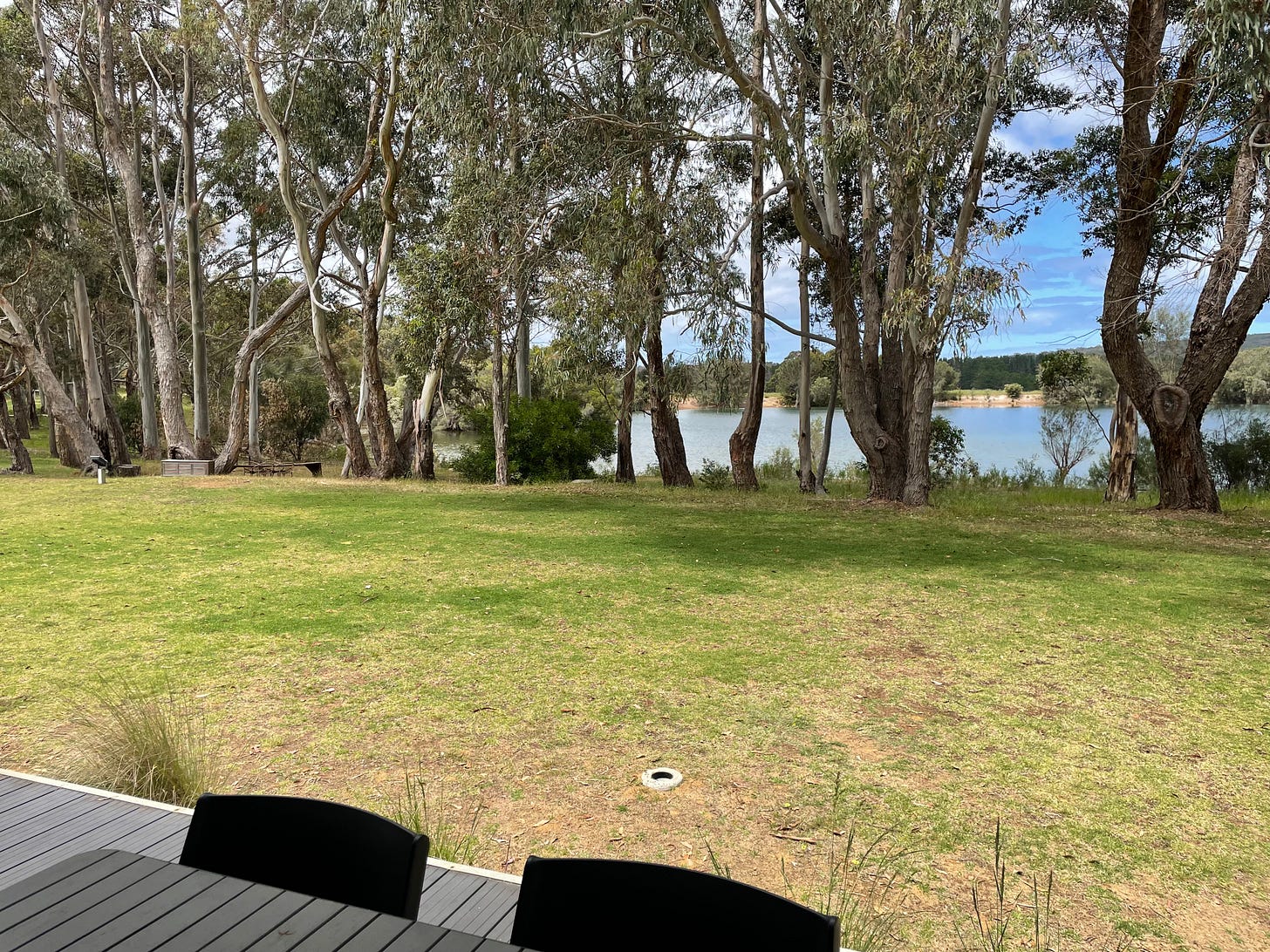 View of lake from glamping bungalow decking