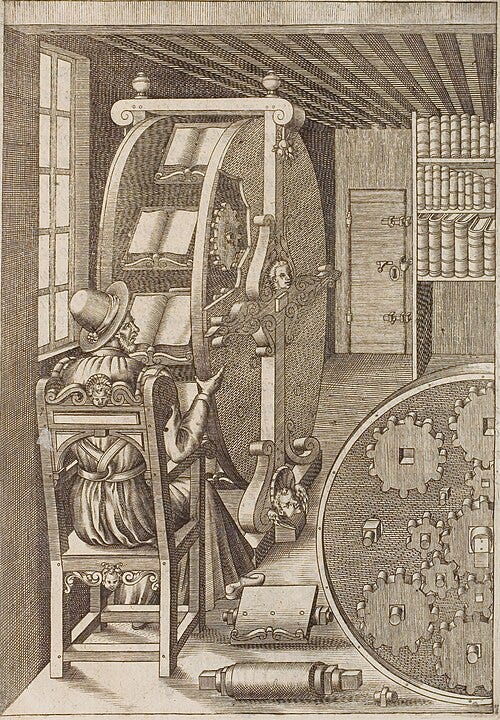 A woodcut of a man in a very fine hat sitting at his book wheel, with multiple books arrayed upon it. In the foreground you can see the working of the cogs. A woodcut of a man in a very fine hat sitting at his book wheel, with multiple books arrayed upon it. In the foreground you can see the working of the cogs.