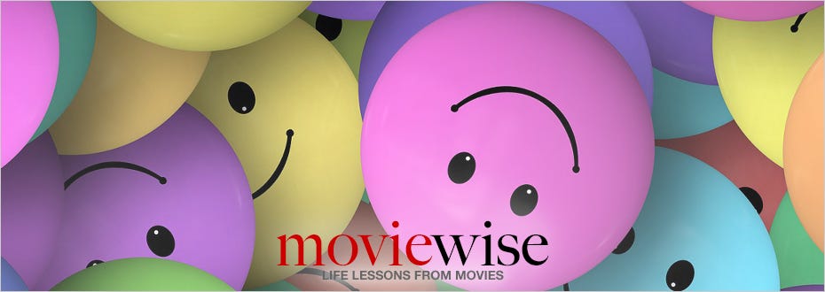 An illustration of assorted colorful, candy-colored, round smiling faces oriented randomly.