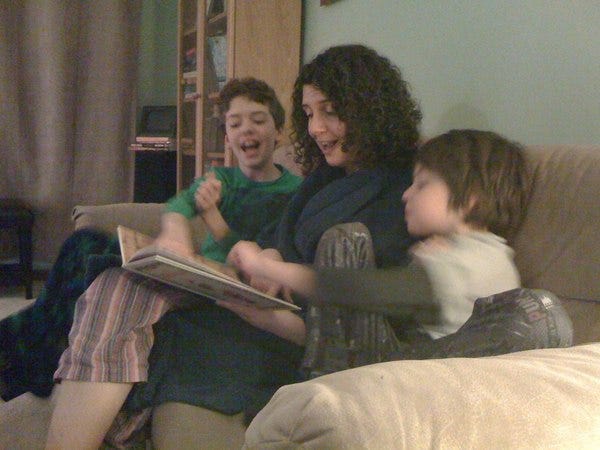 Pictured: Author's family partakes in evolving tradition of reading Santa Mouse Pictured: Author's family partakes in evolving tradition of reading Santa Mouse