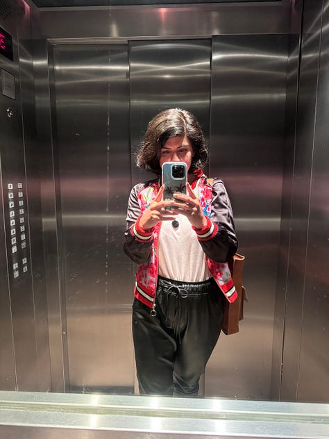 Left: Ines dressed in a green sweater and green dress. Center: Ines dressed in a bomber jacket, pink t-shirt and black faux leather pants. Right: Ines dressed in a bright blue cardi, a yellow t-shirt and black plants.