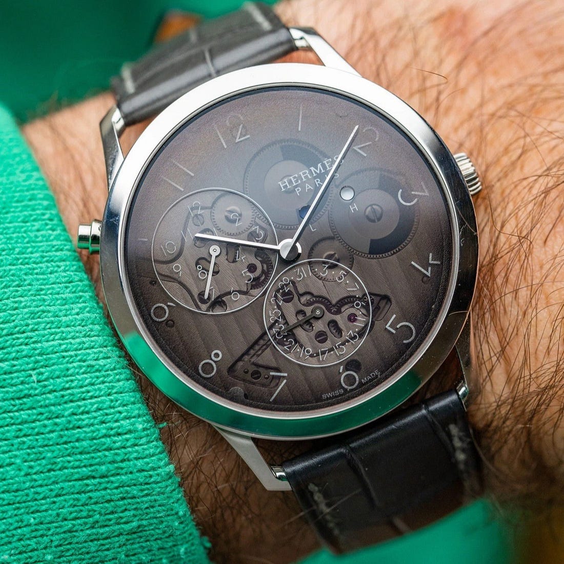 Hermès Slim D'Hermes 39 Platinum / Gray / Arabic / Strap W054157WW00 Listing Image 1 Hermès Slim D'Hermes 39 Platinum / Gray / Arabic / Strap W054157WW00 Listing Image 1