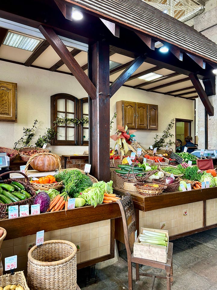 market stands of cheese and vegetables in France