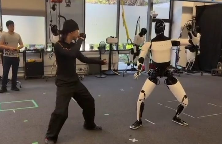A person in a black and white suit with a black hat and black pants

AI-generated content may be incorrect.