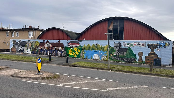 Community mural completed in August 2023.