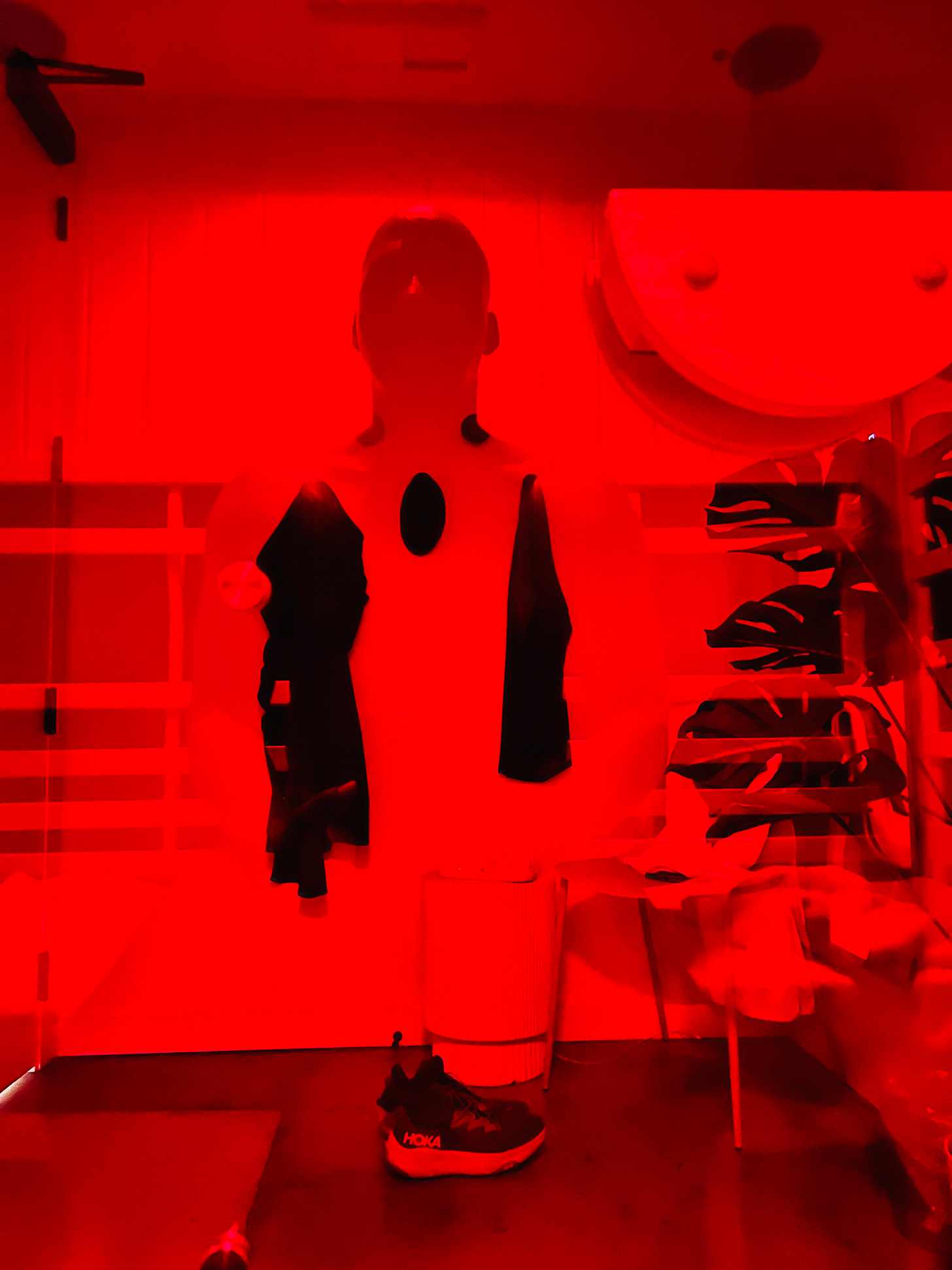 Eric Payne taking a picture of his reflection at the red light sauna.