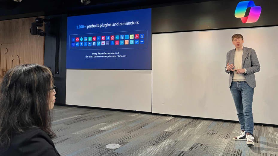 Charles Lamanna, corporate vice president for business applications and platforms at Microsoft, speaks at a press event in San Francisco on Feb. 28, 2024.