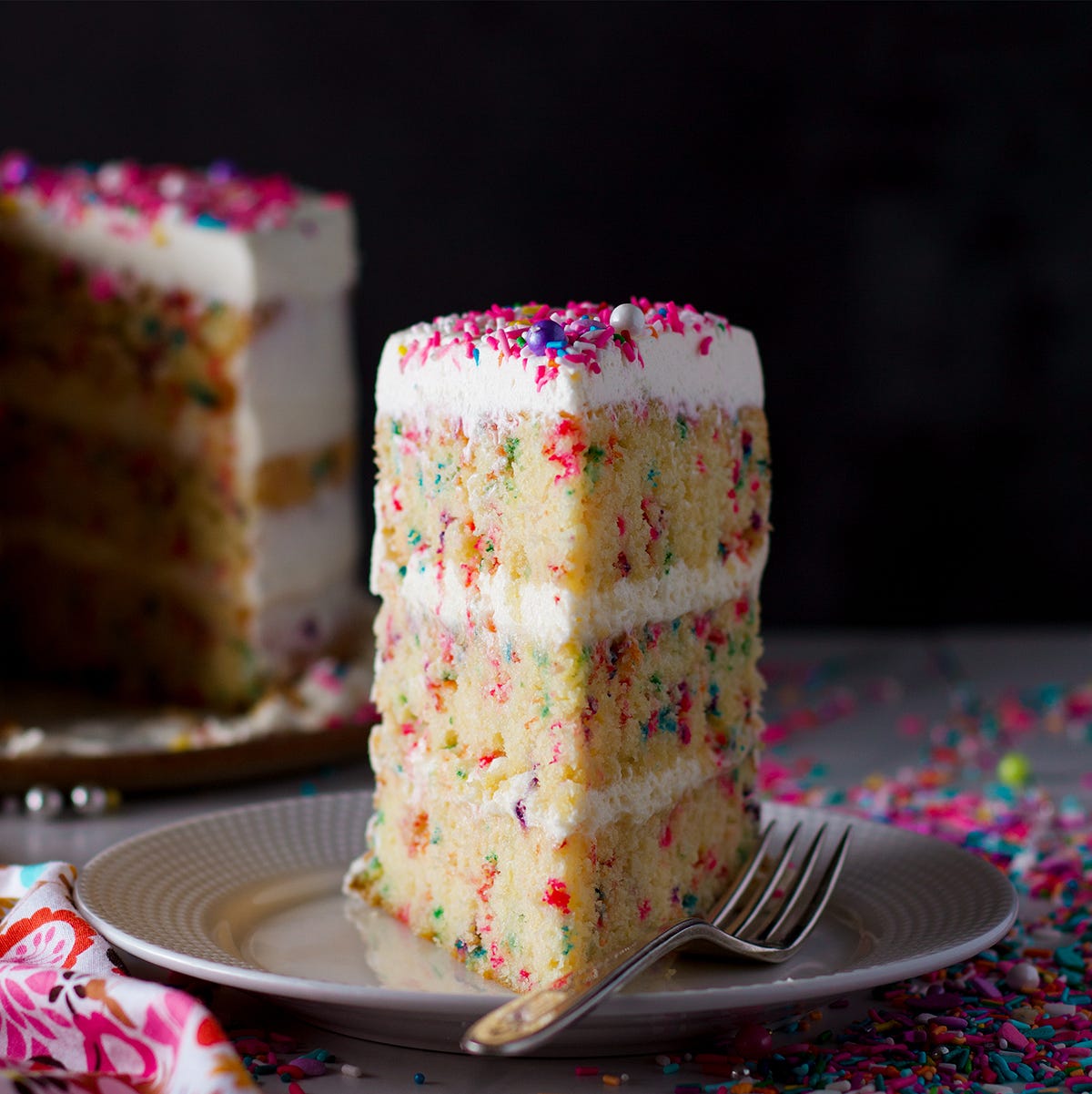A slice of funfetti birthday cake. A slice of funfetti birthday cake.