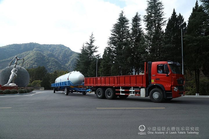 A booster for the Long March 3B/E undergoing transportation to the launch pad and during manufacturing.