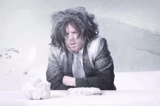 Shivering man in snow