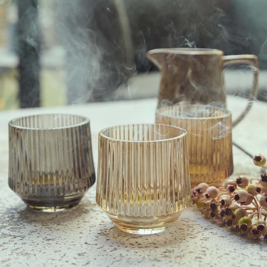 neutral coloured ribbed glass candle holders