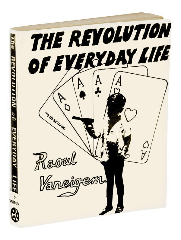 A book cover of “The Revolution of Everyday Life,” by Raoul Vaneigem, with a drawing of a boy holding a gun and standing in front of four large cards — four aces and a joker. A book cover of “The Revolution of Everyday Life,” by Raoul Vaneigem, with a drawing of a boy holding a gun and standing in front of four large cards — four aces and a joker.