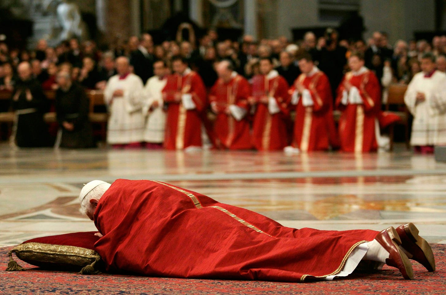 Benedict lies before the altar during a Good Friday ceremony at the Vatican in April 2007. Benedict lies before the altar during a Good Friday ceremony at the Vatican in April 2007.