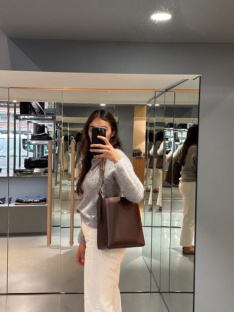 black, brown and yellow purse