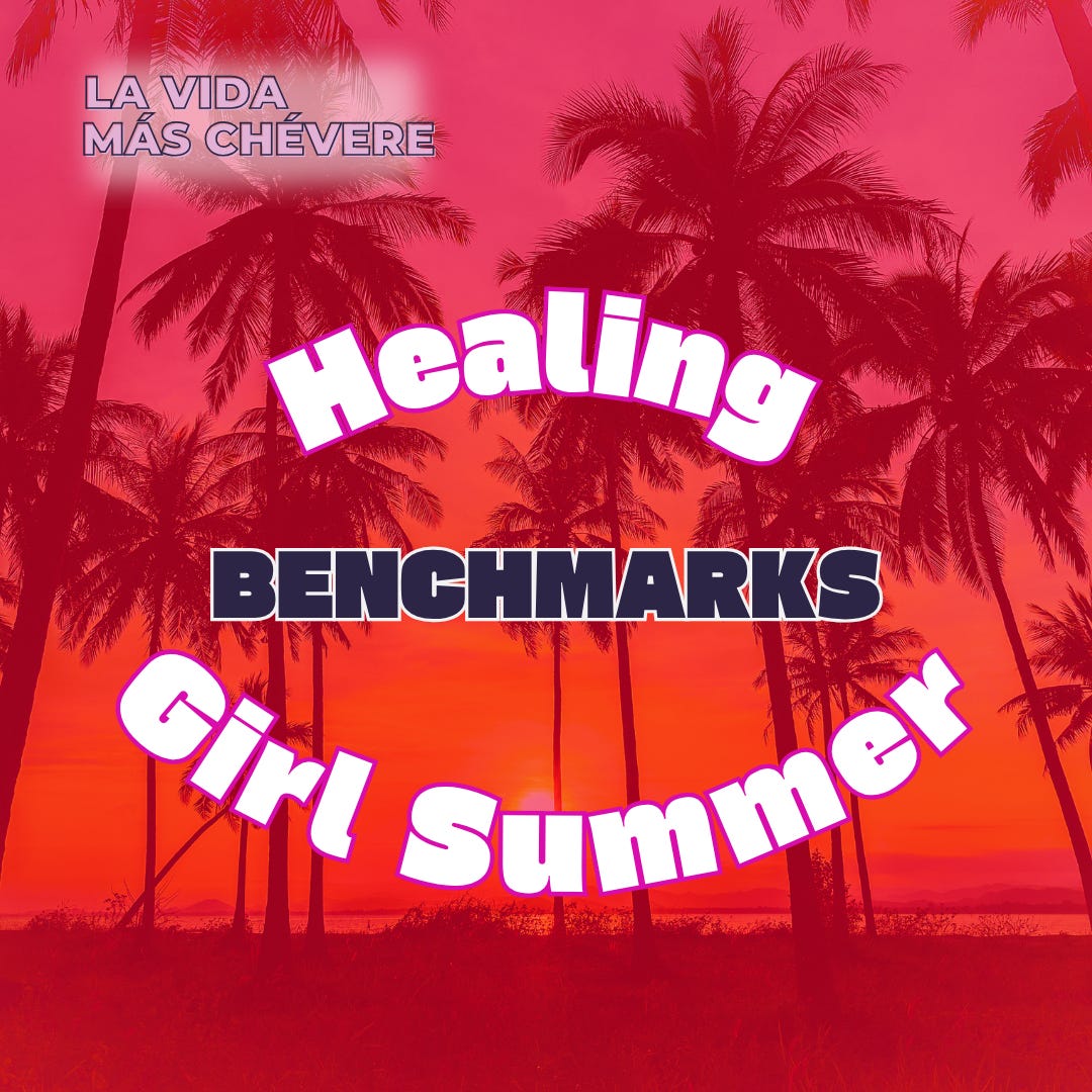 A beach sunset behind a grove of palm trees overlaid in an electric red-orange wash. In bold pink lettering the title of the podcast La Vida Más Chévere is against a white shadow in the upper right corner. Across the middle of the image, in large stylized white font outlined in dark pink, the words Healing Girl Summer make an oval shape around the word BENCHMARKS in black.