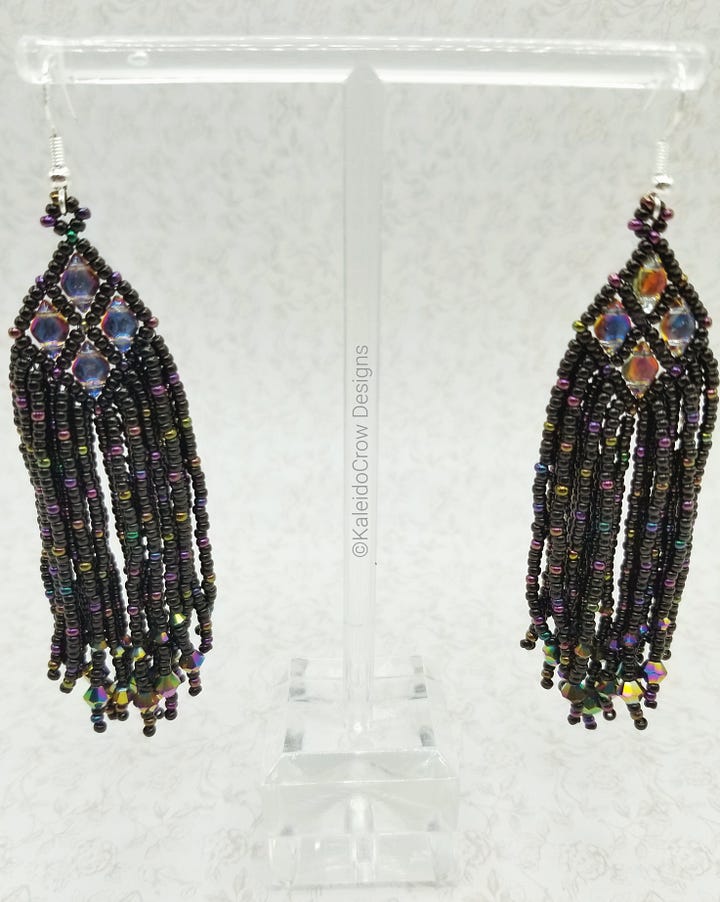 closeup photos of a beaded necklace made from black and rainbow/oil slick color shift beads