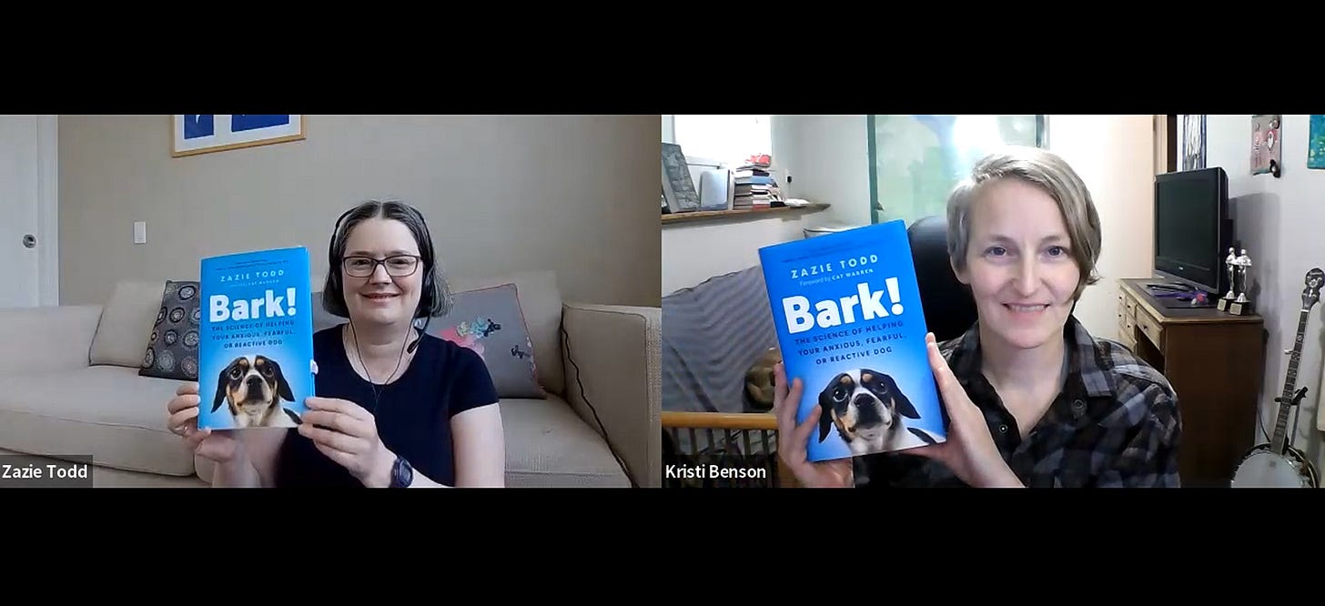 Zazie Todd and Kristi Benson hold up copies of Bark! at Bark! Fest