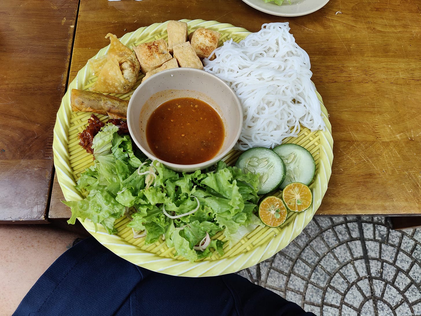 plate of vermicelli tofu, greens, sauce