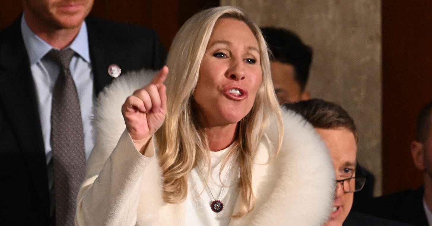 Marjorie Taylor Greene's Heckling Throughout State of the Union—in Photos -  Newsweek