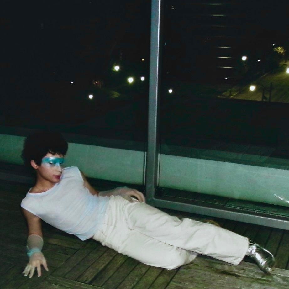 A person lying on the floor

Description automatically generated
