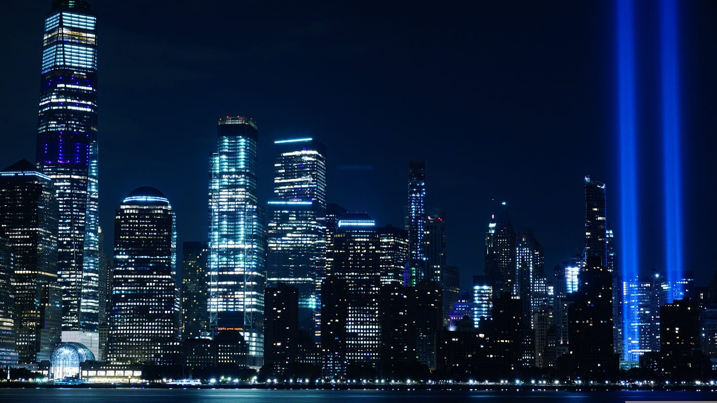 9/11 tribute with spotlights shining into the sky