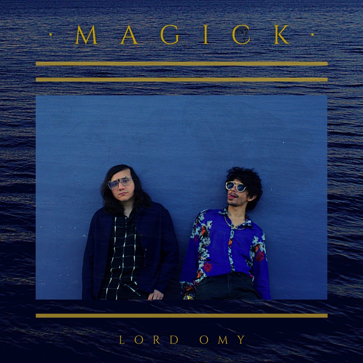 Puede ser una imagen de 2 personas y texto que dice "MAGICK LORD OMY"