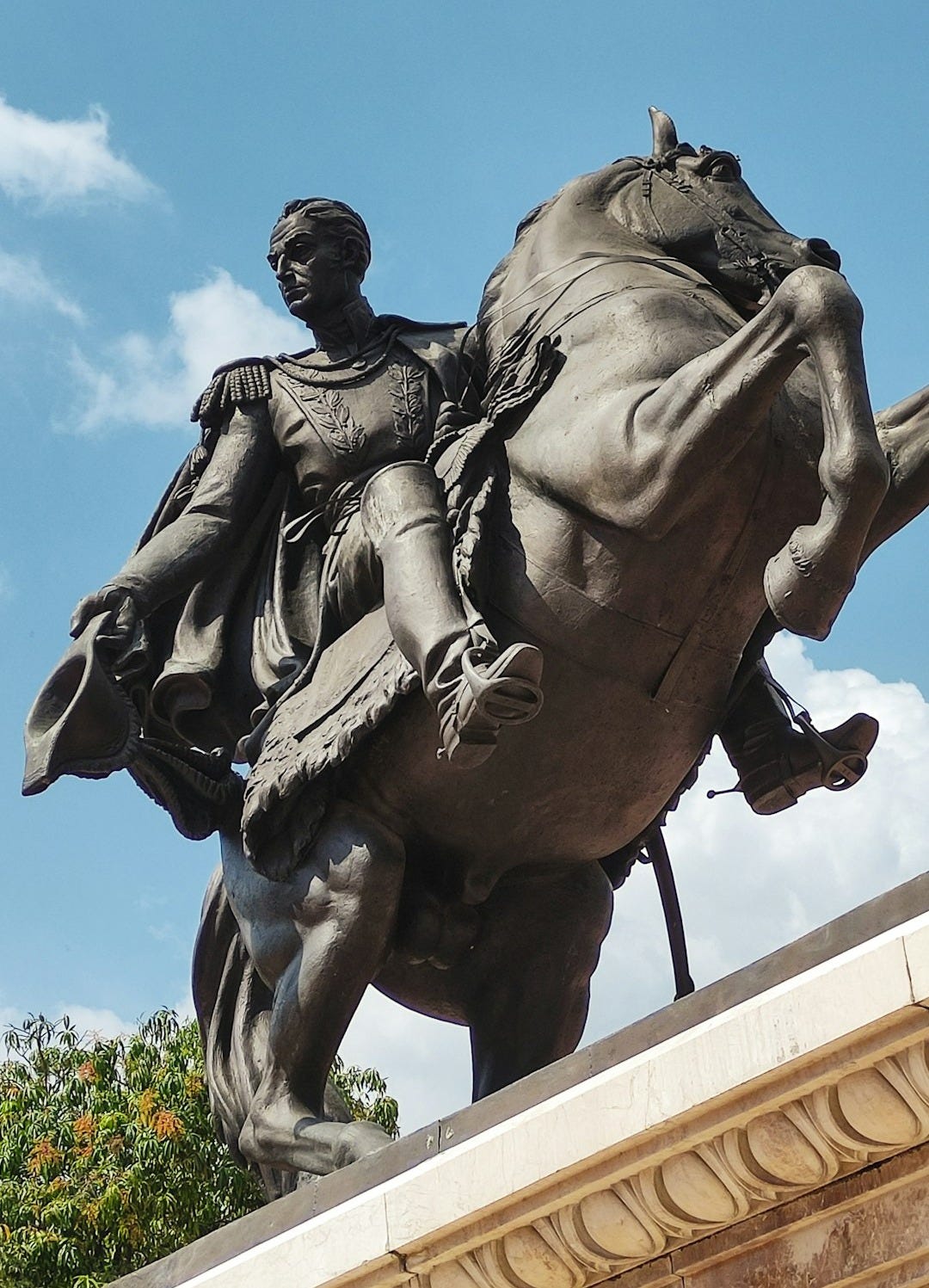 a statue of a man riding a horse