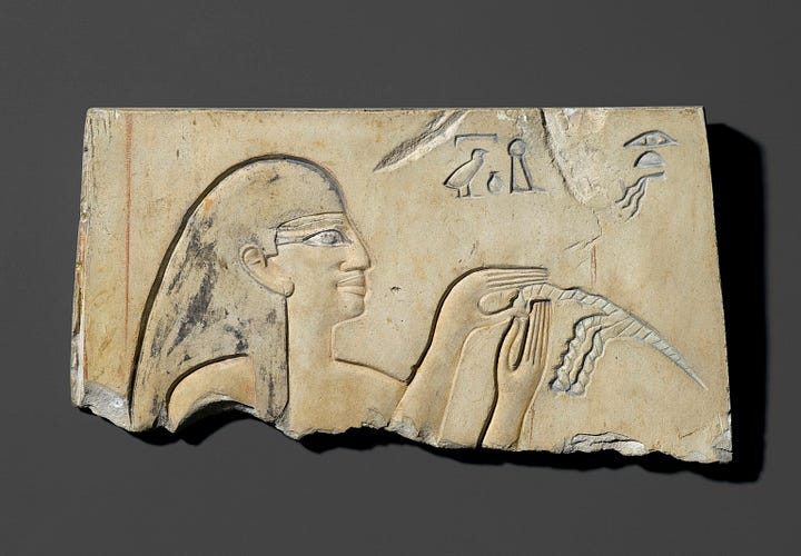 The hairdressing scene relief names the beautician as "Innu"--a rare case of a non-royal being named in 11th dynasty Egyptian art.