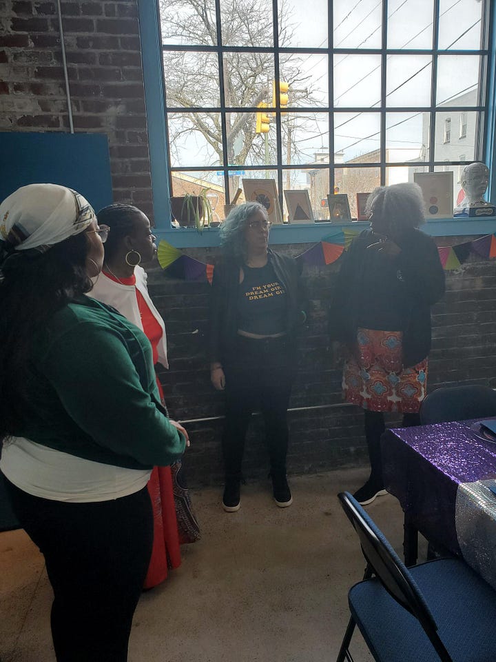 Images from DSM.215's celebration circle, photos of community members sharing food, laughing, and engaging in a gratitude exercise