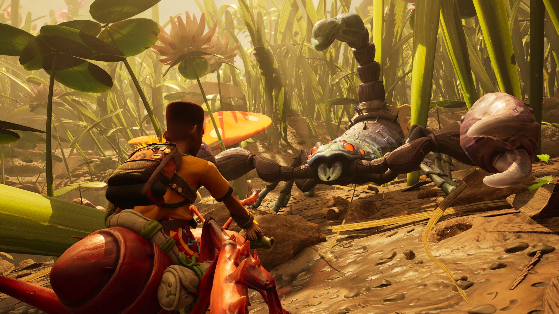Video game screenshot of a boy, shrunken down, riding an ant while facing off with a scorpion. Around them are grades of grass that are, relatively, super-sized