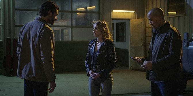 Walker and James with a handcuffed Cali 109. Walker and James with a handcuffed Cali 109.